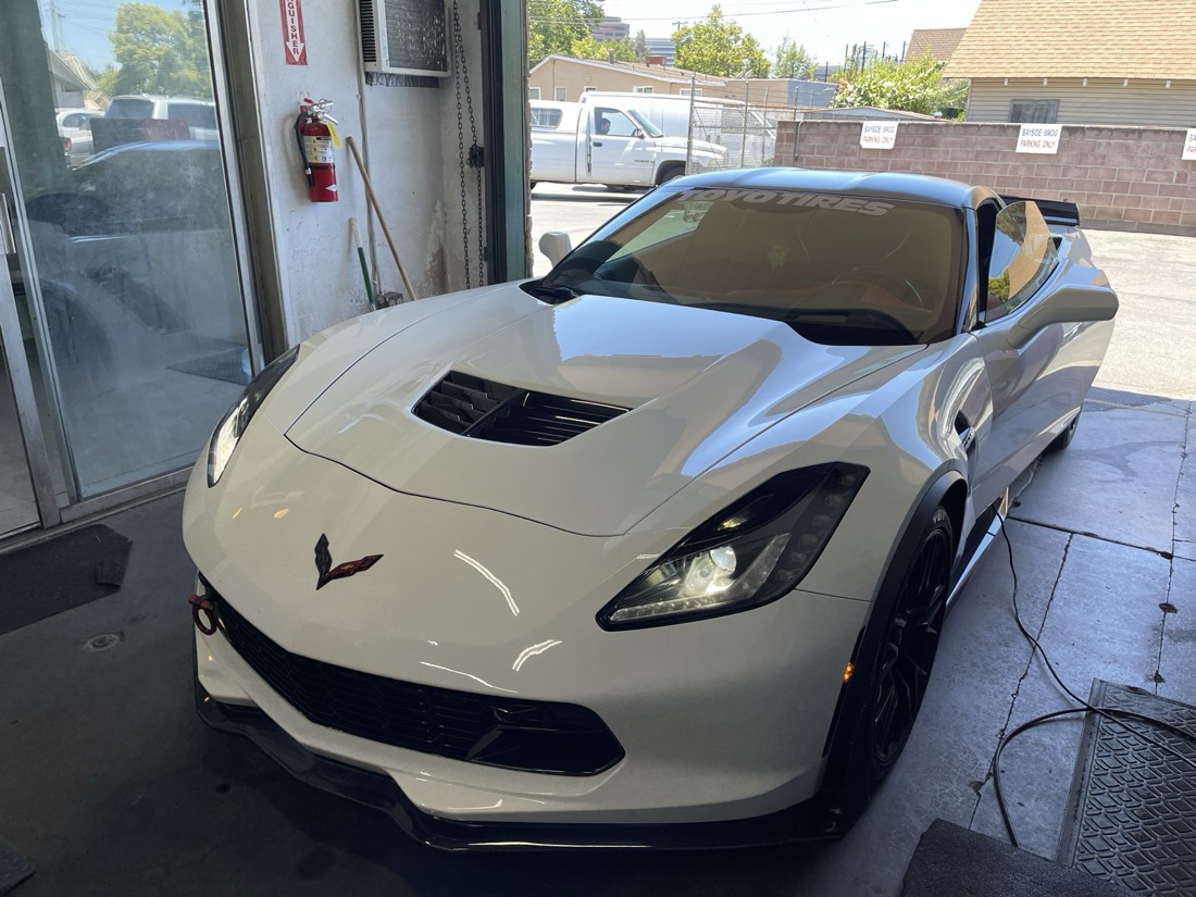 A Corvette getting a smog check at Bayside Smog