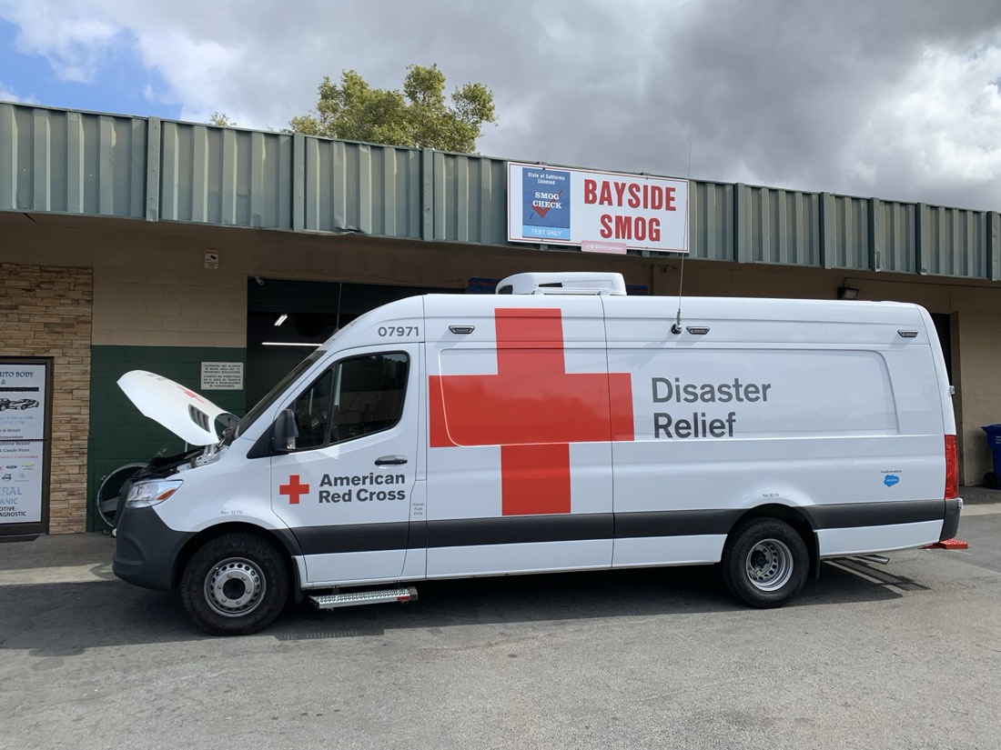 An American Red Cross relief van getting smog tested at Bayside Smog